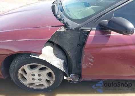 2002 Saturn S-Series Sc1 z USA, uszkodzony, nr VIN 1G8ZN128X2Z261226